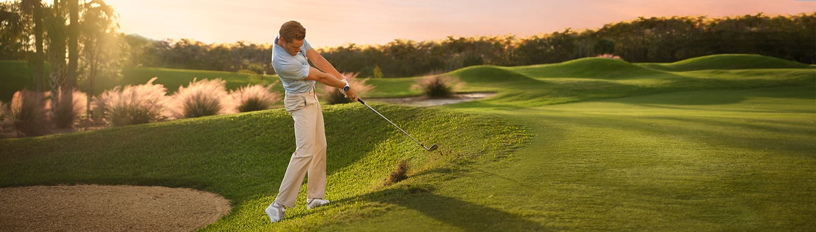 Golf Pro playing golf with Garmin products