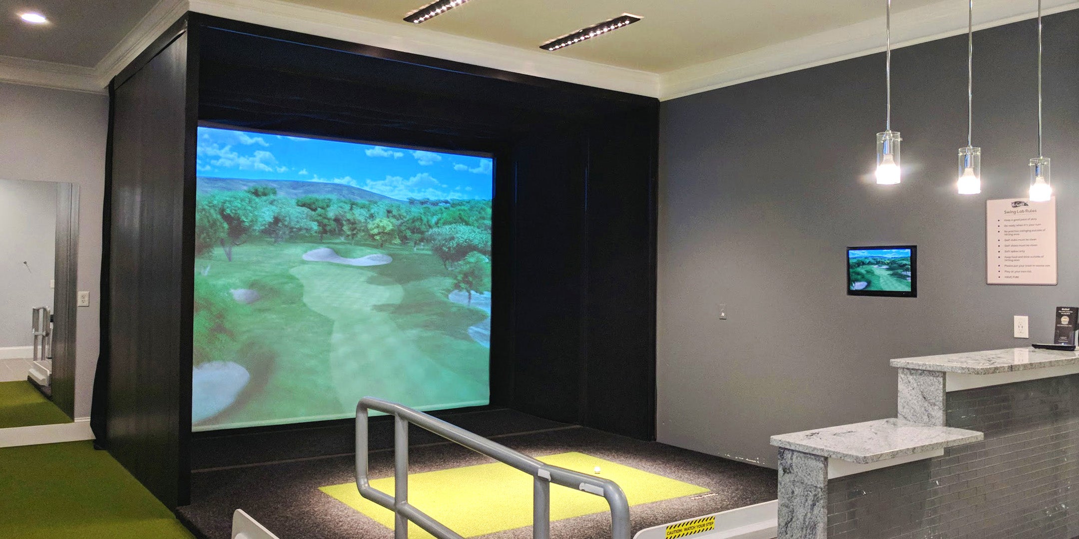 Golf simulator running in hotel or other commercial building